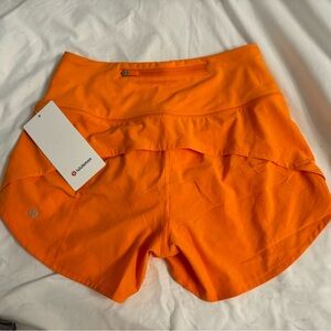 Lululemon Speed Up Running shorts NWT (new with tags) in Lit Orange
